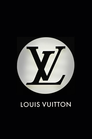 Logos of the luxury goods brand Louis Vuitton on a heap on a table